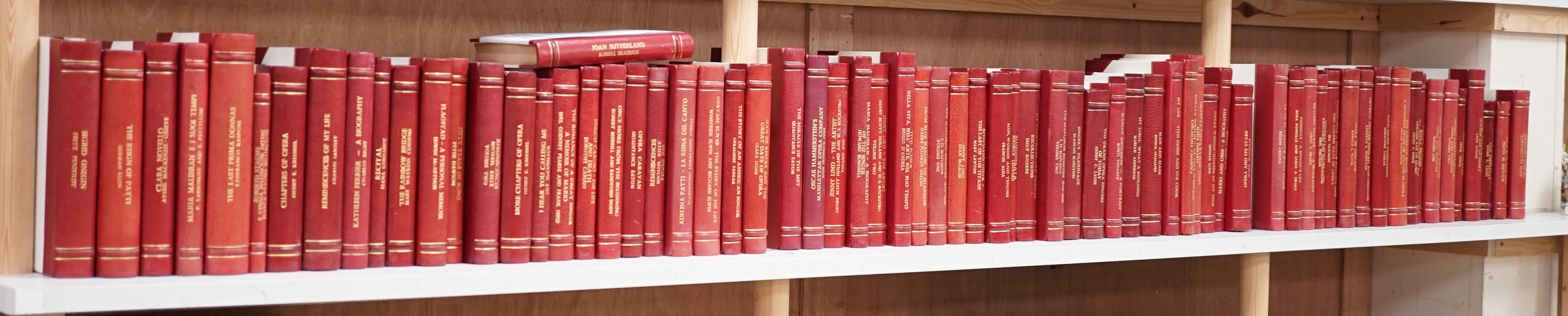 A collection of 19th and 20th century works on opera related biographies, autobiographies and histories, bound in red morocco by EA Weeks, London, one signed by the author, approx. 69 in total. Please note :- A SIMILAR L